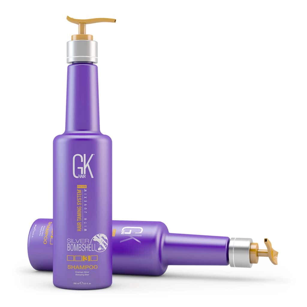 Purple GK Hair Shampoo bottle with pump dispenser for hair care.