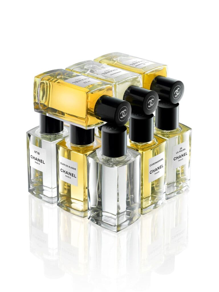 Chanel nail polish bottles in a stylish display for women.