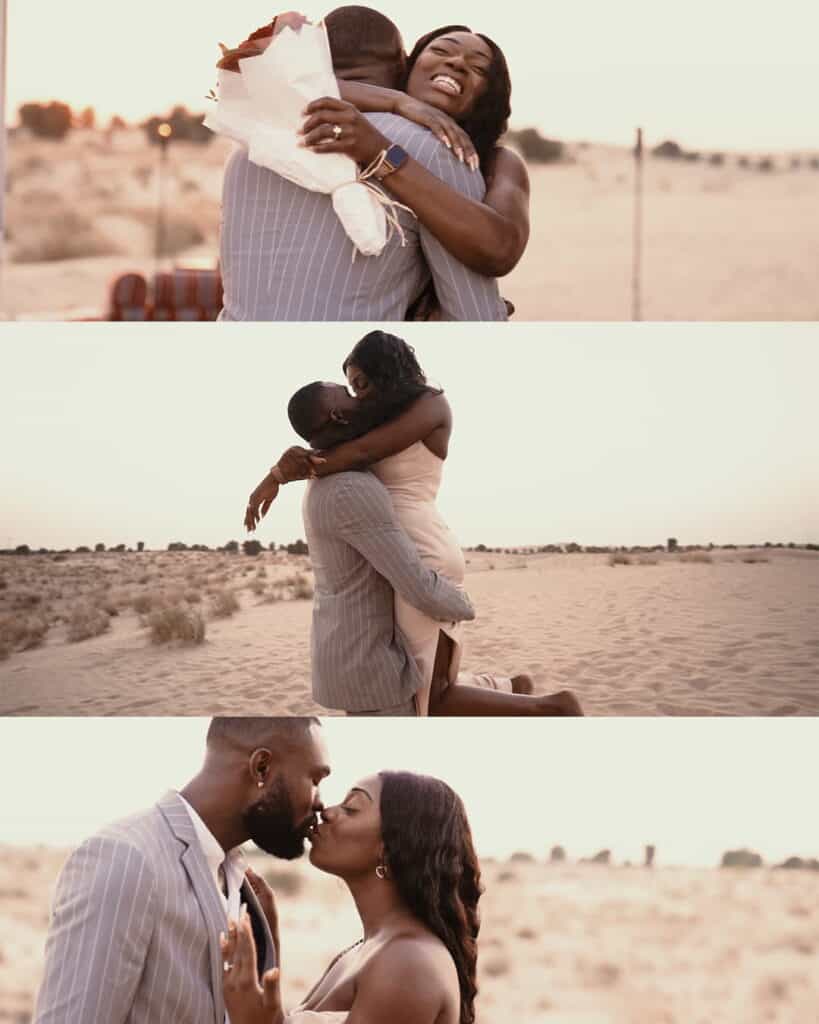 Happy couple hugging and kissing in a desert landscape at sunset.