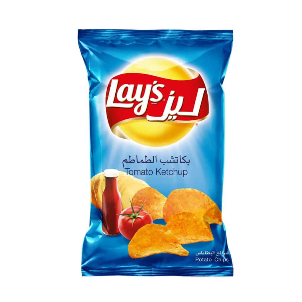 Lay's potato chips with tomato ketchup flavor and fresh tomato image.
