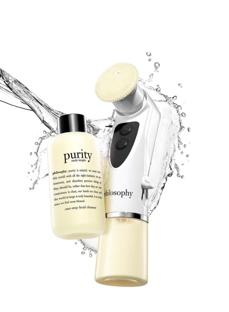 Facial cleansing brush and skincare products for healthy skin.