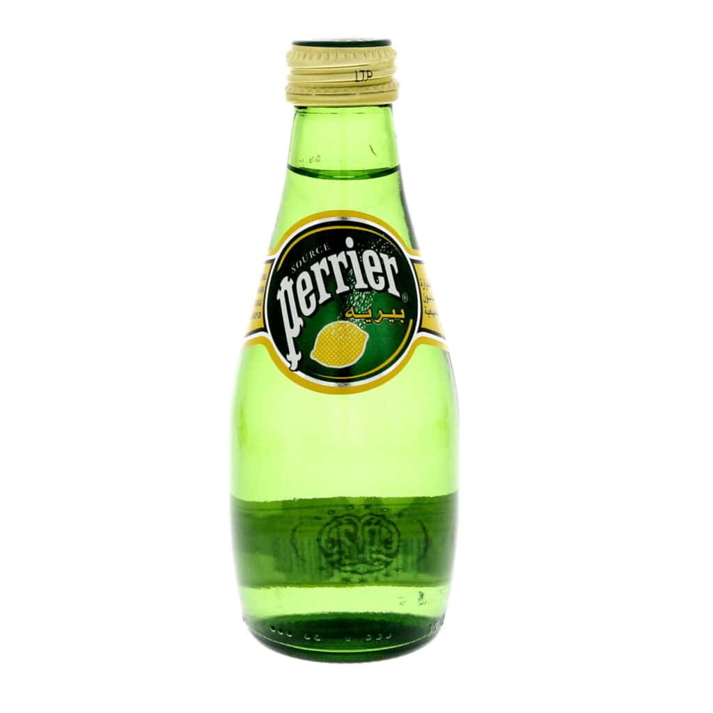 Green Perrier lemon sparkling water bottle with gold cap on white background.