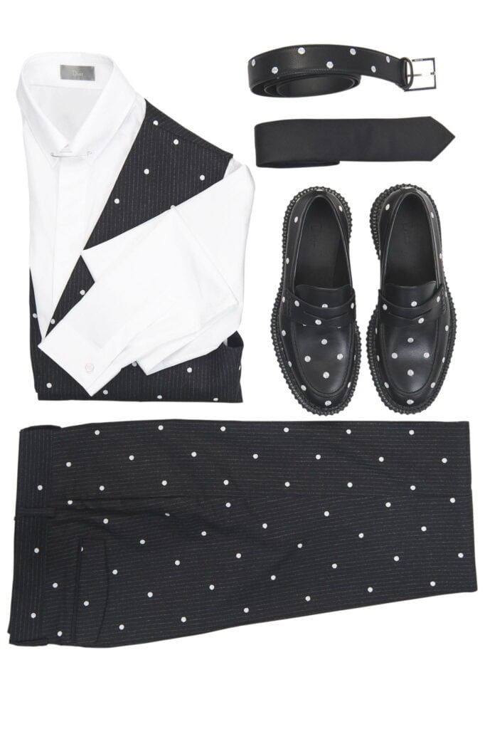 Stylish polka dot shirt, pants, and accessories for men.