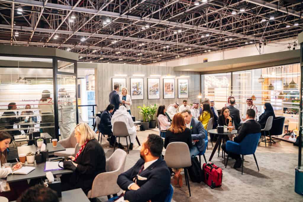 Business professionals in a modern conference room during a meeting.