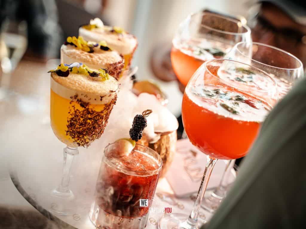 Assorted cocktails and desserts at a luxury event in Dubai.